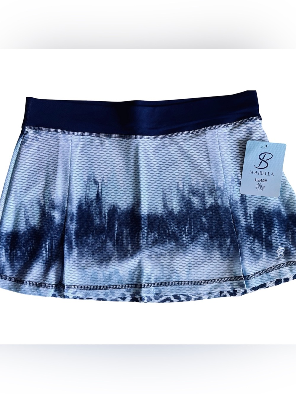 Women's Sofibella skort for active sports. Matching tops available.